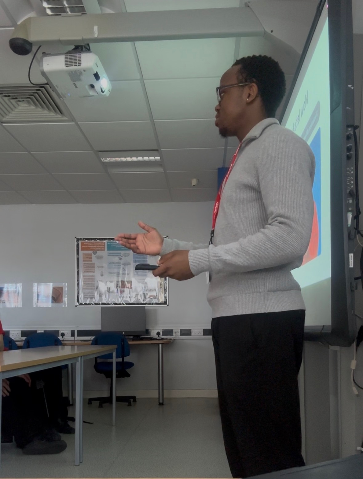 Chinonso Anatune speaking to a room